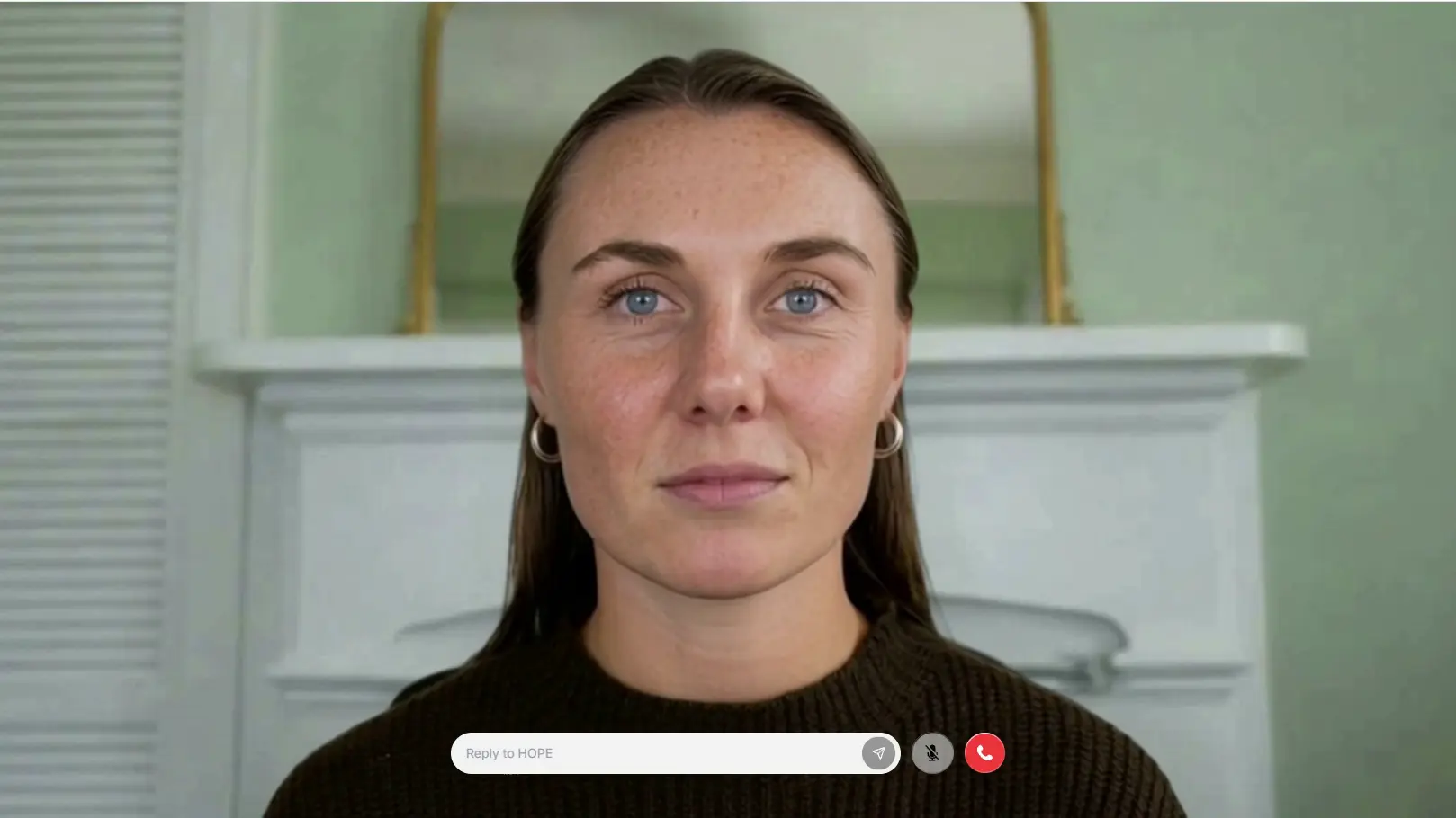 A HOPE conversation: a lifelike metahuman with a reply field, mute and end-call controls